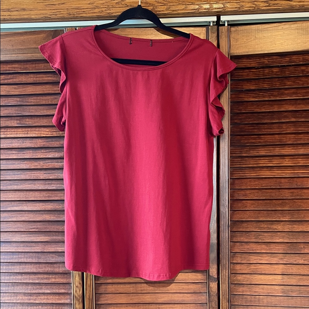 Women’s large ruffled short sleeve top